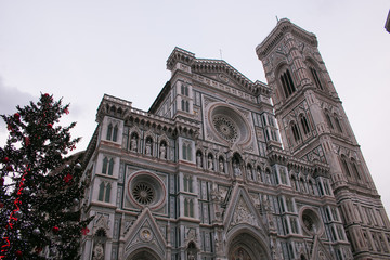 View of Santa Maria Del Fiore cathedral and christmas tree in the historic center of Florence