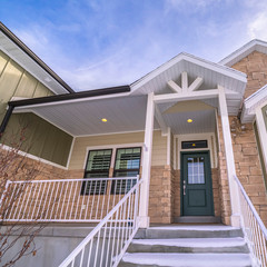 Wall Mural - Square frame Snow covered steps leading to a front door