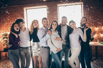 Sticker - Photo of eight best friends celebrating surprise baby party greeting future young parents hugging making portraits confetti falling formalwear restaurant indoors