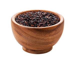 Wall Mural - Black rice in wooden bowl isolated on white background