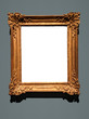 © Niccolo - Blank canvas inside an elaborate golden wooden frame on a gray wall. Shadow on top of white canvas and below the frame matches the lighting.