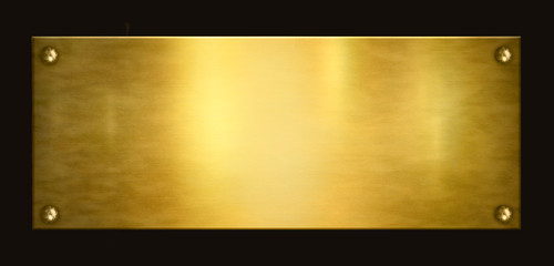 Gold plaque on a black background