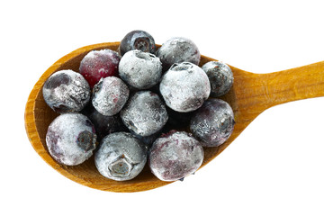 Wall Mural - frozen blueberries isolated on white background