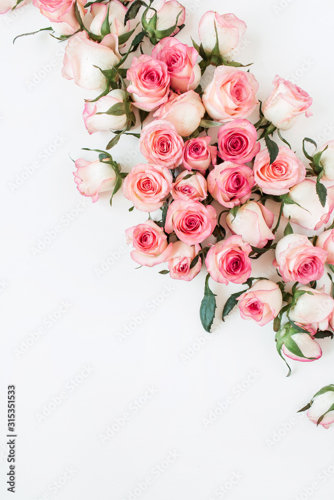 Flat lay rose flower buds. Top view minimal floral composition. - obrazy, fototapety, plakaty 