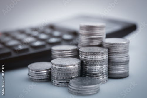 Fotografía copy space , money coins and stationary in white color style for money , banking