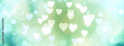abstract-pastel-background-with-hearts-blurred-bokeh-lights