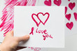  Drawn pink hearts on a white background