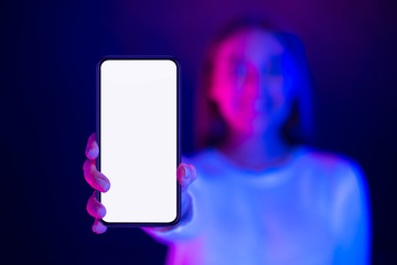 Poster - Cool app. Girl showing phone with blank screen