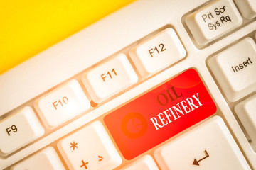 Poster - Text sign showing Oil Refinery. Business photo showcasing industrial process of converting crude oil into petroleum White pc keyboard with empty note paper above white background key copy space