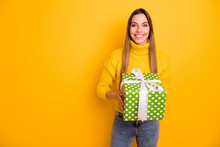 Portrait Of Cheerful Positive Girl Celebrate Christmas Time Party Get Big Green White Dotted Present Box Feel Content Emotions Wear Knitted Jumper Denim Jeans Isolated Shine Color Background