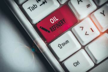 Poster - Handwriting text Oil Refinery. Conceptual photo industrial process of converting crude oil into petroleum White pc keyboard with empty note paper above white background key copy space
