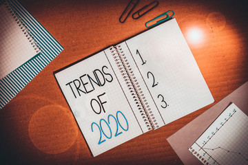 Wall Mural - Conceptual hand writing showing Trends Of 2020. Concept meaning things that is famous for short period of time in current year Striped paperboard cardboard office study supplies chart