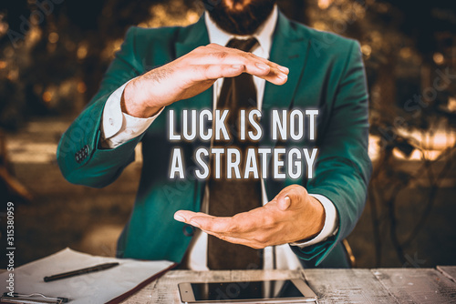 Fotografía Conceptual hand writing showing Luck Is Not A Strategy
