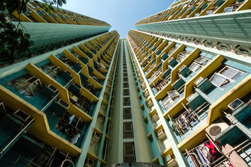 Sticker - looking up on high-rise apartment building, residential building facade, hongkong