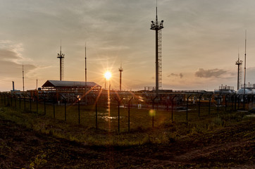 Wall Mural - Gas Production and Processing Plant at Sunrise.