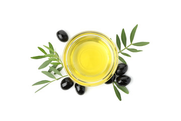 Bowl with olive oil and olives isolated on white background, top view