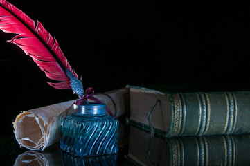 Wall Mural - Quill pen and rolled up papyrus sheets with old books