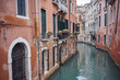 © Juan Alberto Ruiz/ADDICTIVE STOCK - Waterway and ancient buildings at city street