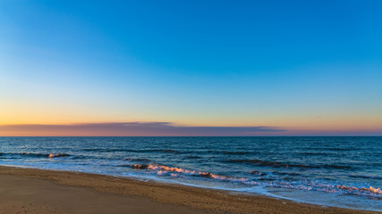 Wall Mural - Sea beach in sunset colors