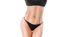 Close Up Photo Of A Sporty Tanned Woman's Body With A Figure Correction Lines.