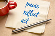 canvas print picture - pause, reflect, act concept - words on napkin