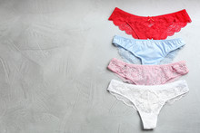 Sexy Women's Underwear On Light Grey Background, Flat Lay. Space For Text
