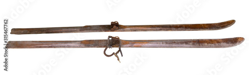 Fotografía A pair of old-fashioned wooden skis isolated on a white background