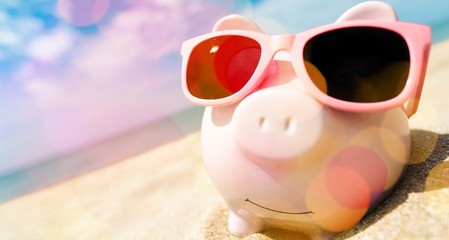 Sticker - Pink piggy bank with sunglasses on the beach