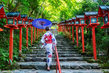 Asian Woman Wearing Japanese Traditional Kimono At  Kifune Shrine In Kyoto, Japan.