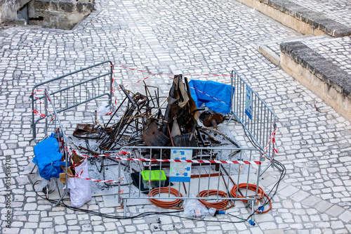 Fotomural Bond 25, Scenography elements used for explosion and fire scenes from the movie No Time to Die in Sassi, Matera, Italy