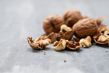 Poster - fresh dry walnut on ceramic background