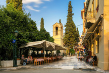 Old Cozy Street In Plaka District, Cafes And Restaurants In Athens, Greece