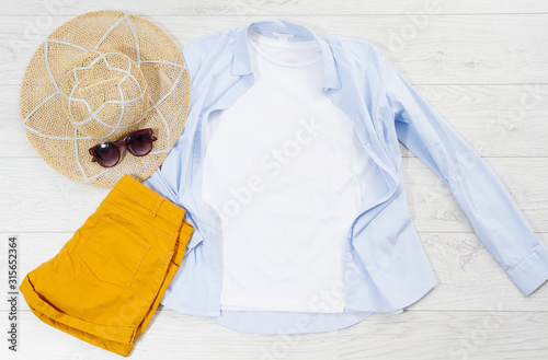 Premium Photo Flat Lay Baby Clothes With Wooden Background