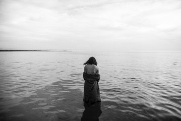 Wall Mural - Woman portrait on sea in water