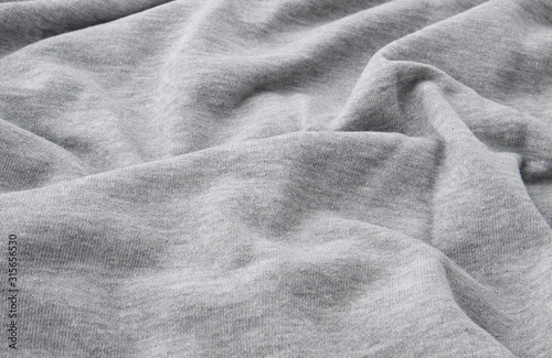 Fotografía gray cotton stretch fabric for sewing clothes, canvas with waves