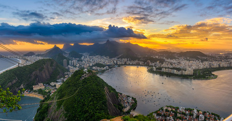Fototapete - Sunset view of Copacabana, Corcovado, Flamengo, Botafogo and Centro in Rio de Janeiro, Brazil. Panorama of Rio de Janeiro and Guanabara bay. Skyline of Rio de Janeiro