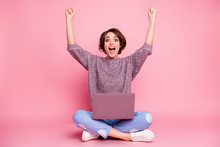 Portrait Of Nice Attractive Lovely Charming Cheerful Cheery Brown-haired Girl Sitting In Lotus Pose Using Laptop Rising Hands Up Celebrating Attainment Isolated Over Pink Pastel Color Background