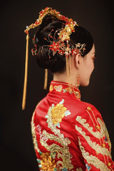 Wall Mural - Asian bride wearing chinese wedding costume
