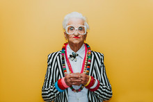 Funny Grandmother Portraits. Senior Old Woman Dressing Elegant For A Special Event. Granny Fashion Model On Colored Backgrounds