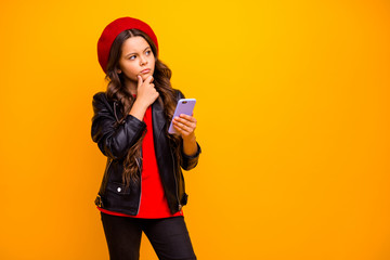 Sticker - Portrait of her she nice attractive trendy bewildered long-haired girl wearing streetstyle using cell creating new post isolated over bright vivid shine vibrant yellow color background