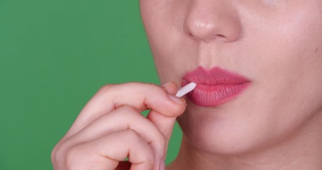 Poster - Beautiful young woman with sweet lollipop, closeup