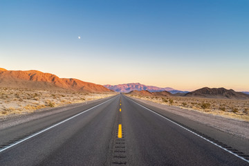 Poster - View of the highway going from Los Angeles towards Las Vegas at sunset