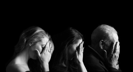 Portraits of people in front of a black background