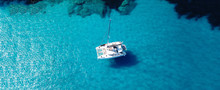 Aerial Drone Ultra Wide Photo Of Sailing Yacht Docked In Paradise Turquoise Sea Exotic Island Destination