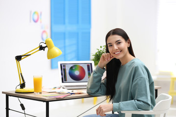 Poster - Portrait of female designer in office. Creative profession