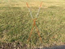 X Marks The Spot In The  Field Using 2 Driveway Snow Pole Markers
