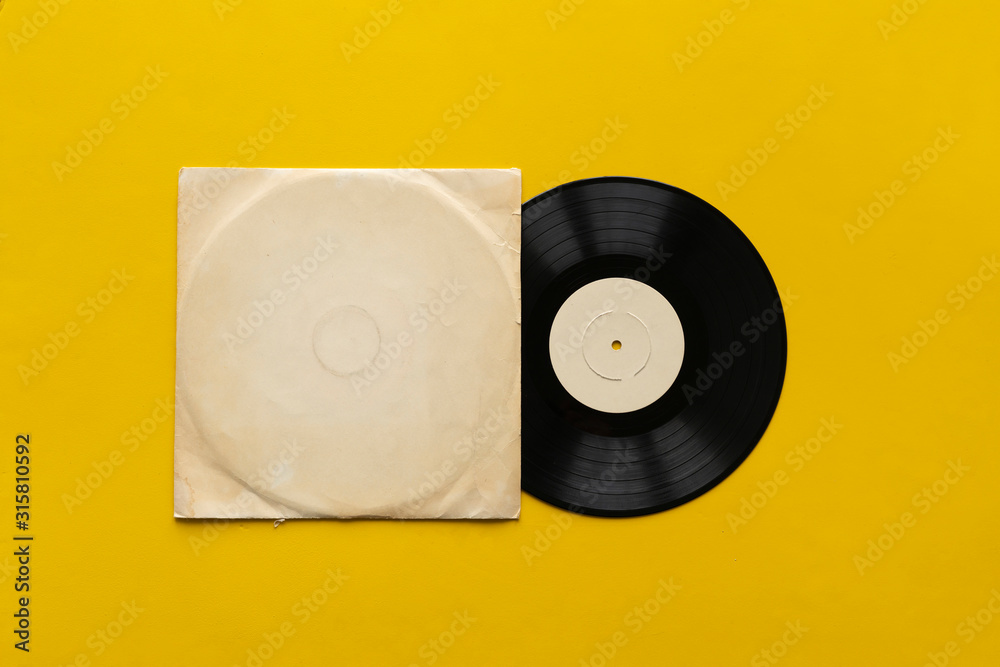the mockup template with the new vinyl disc on color surface, music album cover design - obrazy, fototapety, plakaty 