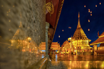 Beautiful Pagoda with reflection, Wat phra that doi suthep temple in Chiang mai thailand, the most famous temple at twilight, Yi Peng and Loy Krathong (Lantern Festival).