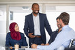 © Rido - Multiethnic business people in meeting