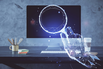 Desktop computer background in office and start up theme hologram drawing. Double exposure. Startup concept.